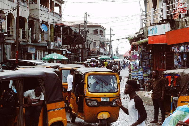 Photo dipicting a busy street in Nigeria | credit: Muhammadtah Ibrahim Ma'aji on Unsplash