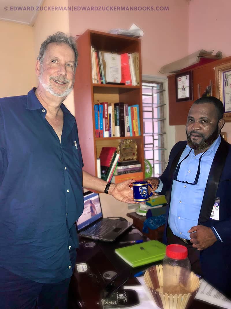 Photo of Edward Zuckerman meeting a Nigerian Police Official in the headquarters of Nigeria Police Force Criminal Investigation and Intelligence Department | credit: Edward Zuckerman